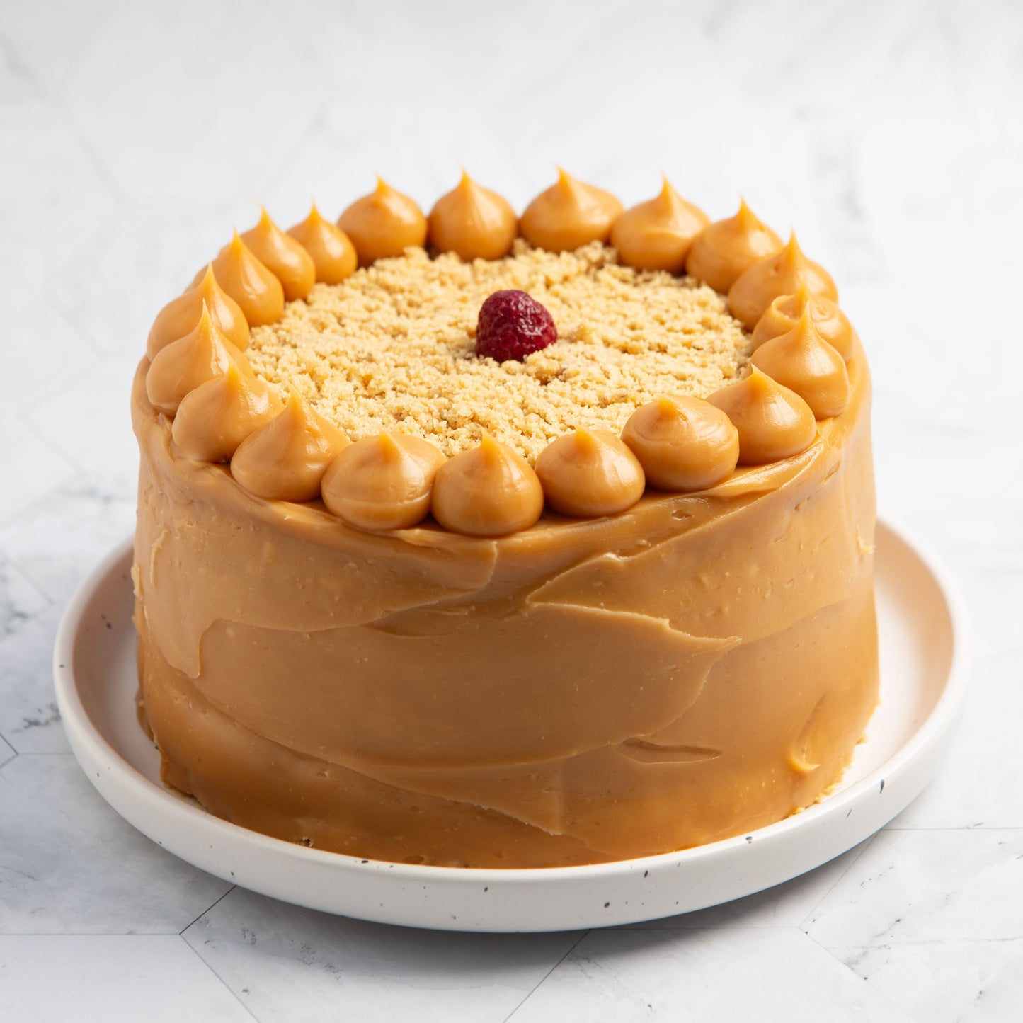 Torta de Caluga, frambuesa y nuez